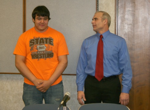 Pedro Gomez, who won the Class 3A 285-pound state wrestling title, was recognized in front of the School Board Monday night, along with his coach, Mike Mann. Gomez plans to attend Ellsworth Community College after graduating from Marshalltown High School, where he will play football and wrestle. Gomez is the first Bobcat to claim a state wrestling title since 2003.